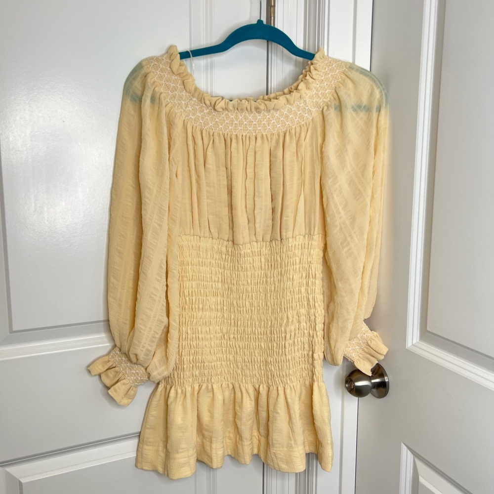 Cream ruched off the shoulder dress